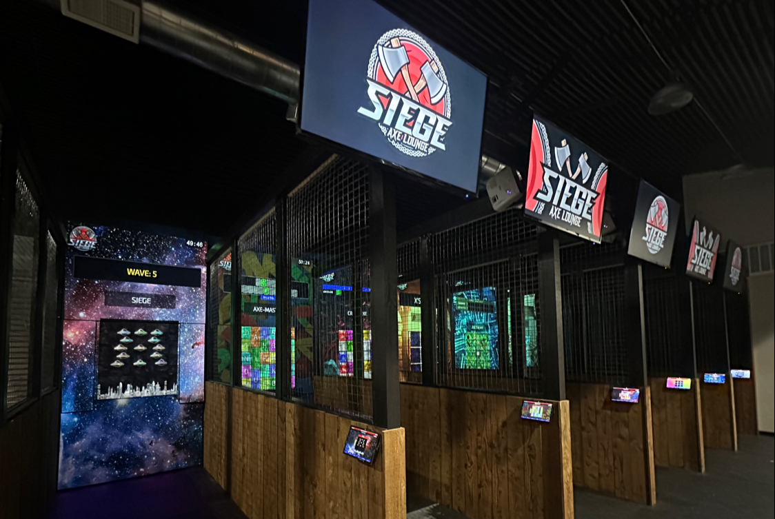 Siege — Axe Throwing, Pool, Golf & Racing Sim, Team Building